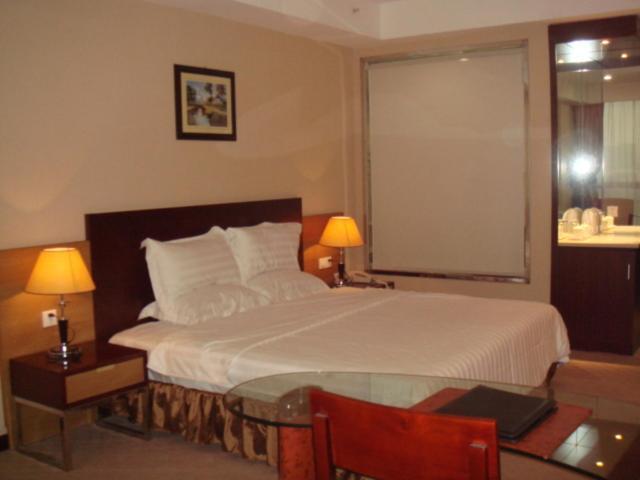 Neighbourhood Holiday Hotel Suzhou Суджоу Стая снимка